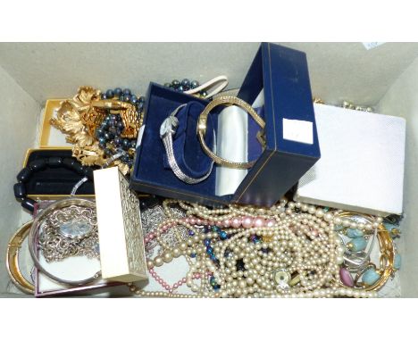 Two ladies Rotary watches; a silver bangle; pendant and chain bracelet; a selection of costume jewellery