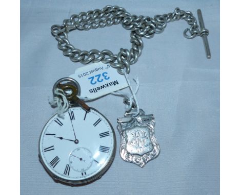 A 19th century engine turned white metal pocket watch, open front, key wound, with heavy chain and medallion