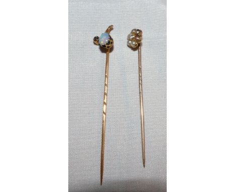 A diamond and opal set stickpin; a diamond and seed pearl stickpin