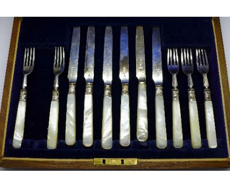 A cased set of silver and mother of pearl knives and fork, one fork missing