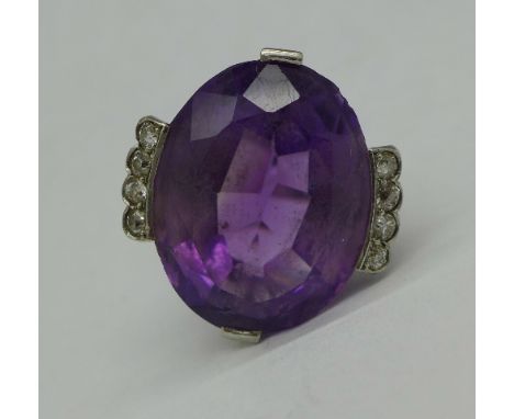 A platinum set, amethyst and diamond Art Deco ring, 11g, O, 20mm x 16mm amethyst