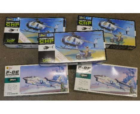 Five Hasegawa model kits comprising three 1/48th scale CHP helicopters and two 1/72 scale, U.S. Navy Fighters, boxed