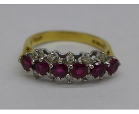 An 18ct gold, diamond and ruby ring, 4.3g, M