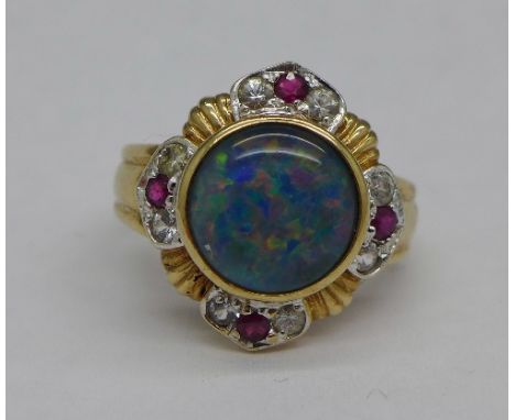 A 9ct gold, doublet opal, red and white stone ring, 4.5g, N