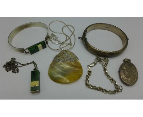 A Suko .925 silver, ivory and green stone bangle and pendant, a silver bangle, a .925 silver locket, a .925 silver bracelet, 