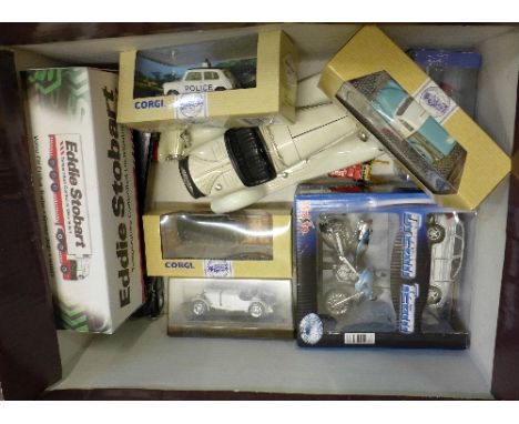 An Eddie Stobart 1:76th scale die-cast vehicle, Volvo FH Fridge Trailer, four Police die-cast vehicles and other model vehicl