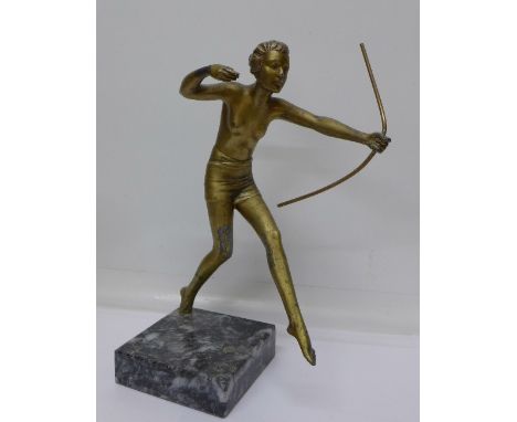 An Art Deco figure of a female archer, lacking arrow, 27cm