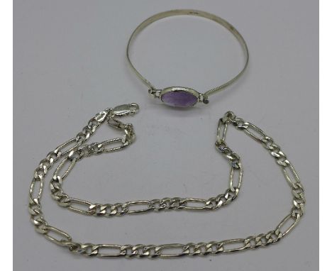 A silver chain and a silver and amethyst bangle