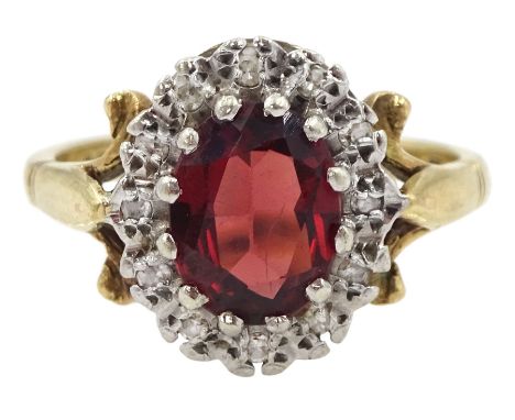 9ct gold garnet and diamond chip cluster ring, hallmarkedCondition Report:Approx 3.15gm, size K-L, head = 12.5mm x 10mm