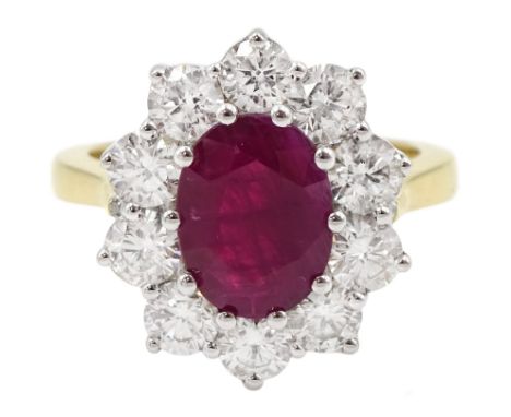 18ct gold oval ruby and round brilliant cut diamond cluster ring, hallmarked, ruby 2.25 carat, total diamond weight 1.50 cara