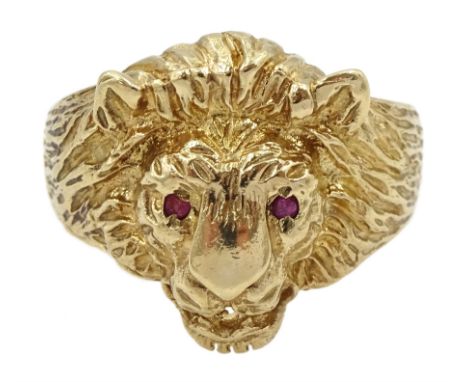 9ct gold lion ring, with ruby eyes, hallmarkedCondition Report:Approx 9gm, size X, ax depth = 19mm, good condition, no date l