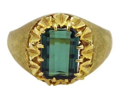 18ct gold single stone emerald cut green tourmaline ring, with engine turned shoulders, Birmingham import marks 1968Condition