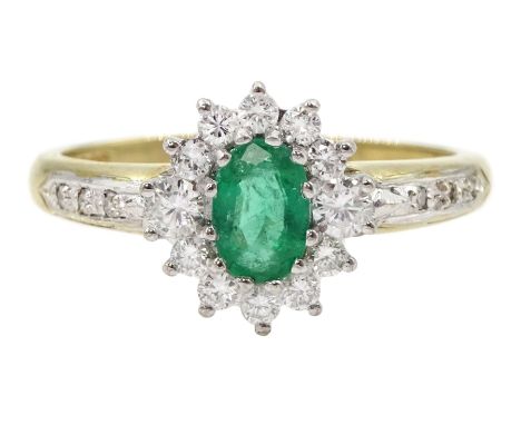 9ct gold oval emerald and round brilliant cut diamond cluster ring, with diamond set shoulders, hallmarkedCondition Report:Ap