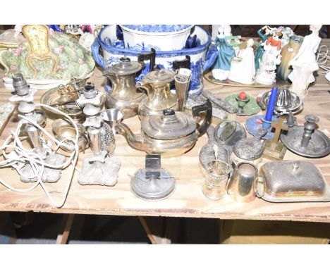 A mixed group of metal waresto include two hot water pots, teapot, pedestal dish, various spoons, sauce boats, milk jug, open