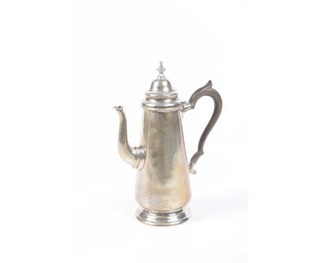 A hallmarked silver coffee pot, Chester 1923Having a domed hinged cover and knopped finial above a tapering body applied with