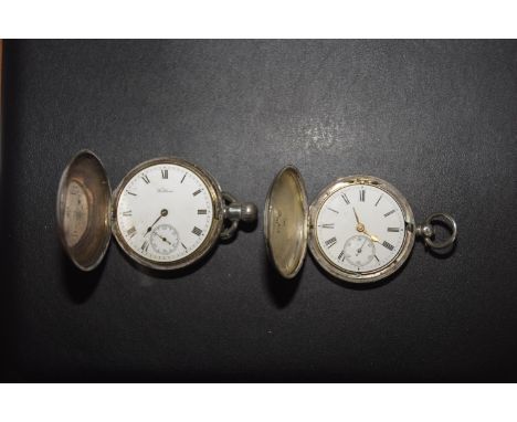 Two silver hunter pocket watchesEach opening to reveal a white enamel dial with Roman numeral hour markers and subsidiary sec