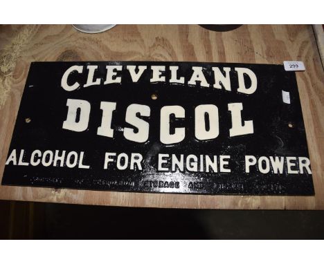 A rectangular black and white cast iron advertising wall plaqueThe black ground wall plaque with white raised lettering 'Clev