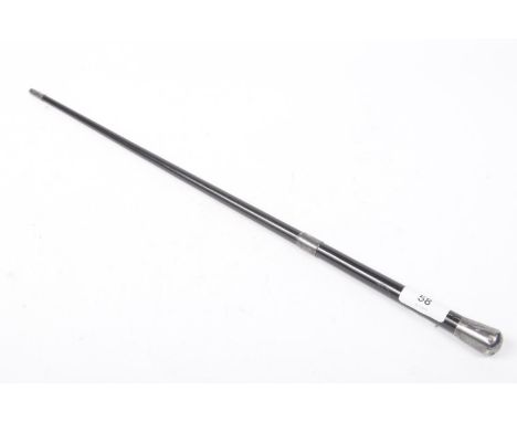A silver and ebonised conductor's baton Of typical form with silver collar, tip and end.  Hallmarks rubbed, 52cm in length. 