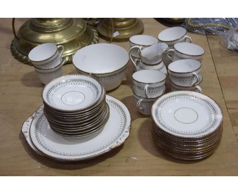 A 19th Century porcelain 40 piece tea serviceApplied with gilt and turquoise decoration to include two sandwich plates, 12 cu