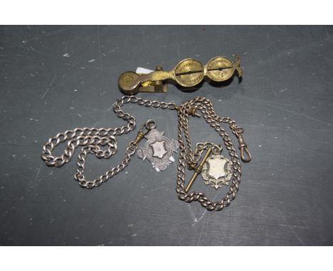 Hallmarked silver watch chain and fob, early 20th CenturyThe fob with initial R.E.O dated 9 March '23, further white metal wa