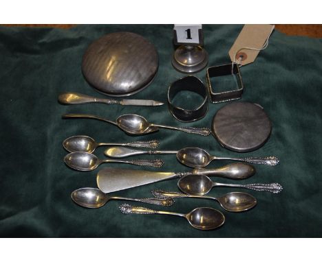 A collection of silver itemsTo include a three piece silver handled manicure set, eight silver teaspoons Sheffield 1923, A Ge