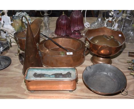 A mixed of group of copper itemsTo include a hexagonal pedestal bowl with twin  lion mask handles (height 21cm)  A rectangula