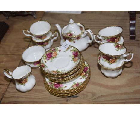 A Royal Albert 'Old Country Roses' tea setComprising six tea cups and saucers, six side plates, teapot, milk jug and sugar bo