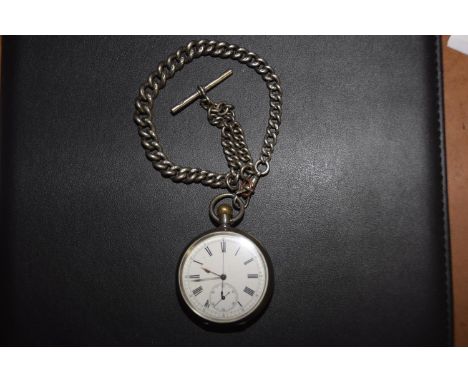 A silver pocket watch The white enamel dial with Roman numeral hour markers and subsidiary seconds dial, with silver Albert c