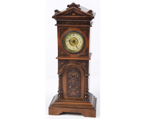 An early 20th Century mantle clock in the form of a longcase clockHaving an architectural case with a 5cm enameled and gilt d