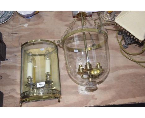 A glass hanging pendantThe glass light with three light terminals with three Phoenix hanging terminals together with a brass 