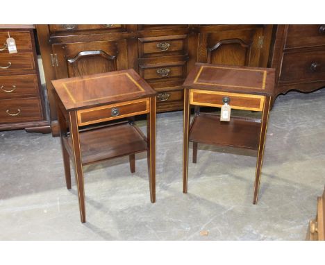 A pair of reproduction mahogany and satinwood cross banded lamp tablesEach table with a rectangular top above a cross banded 