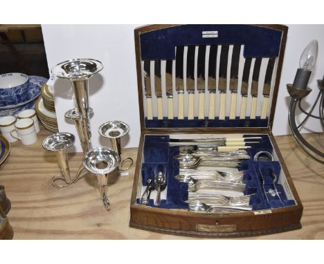 A wooden canteen of Walker & Hall cutleryTo include six table knives, six cheese knives, carving fork and knife, pickle fork,