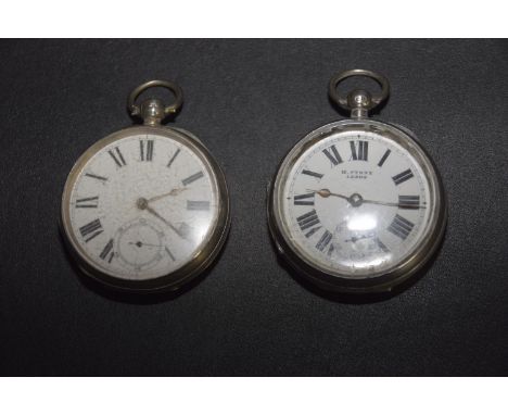 Two silver pocket watchesEach with a circular white enamel dial and Roman numeral hour markers, with subsidiary seconds dial,
