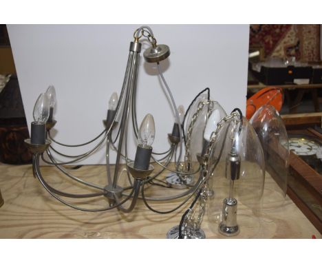 A metal hexagonal shaped chandelier The chandelier with six candle bulb terminals flowing to a central stem, together with fo
