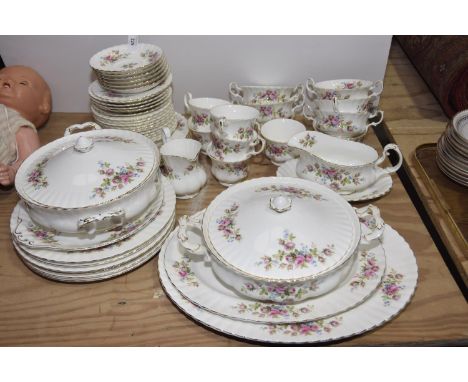 A Royal Albert 'Moss Rose' tea and dinner serviceComprising four teacups, six saucers, milk jug, gravy boat and saucer, six t