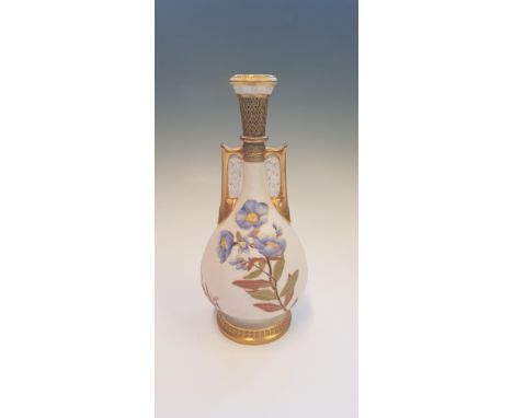 A Royal Worcester two handled vase, decorated with gilded detail and country flowers on blush ground, height 25cm. IMPORTANT: