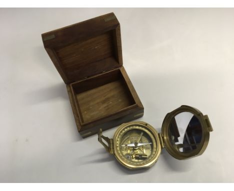 A Stanley London Natural Sine brass compass in wooden box. IMPORTANT: Online viewing and bidding only. No in person collectio