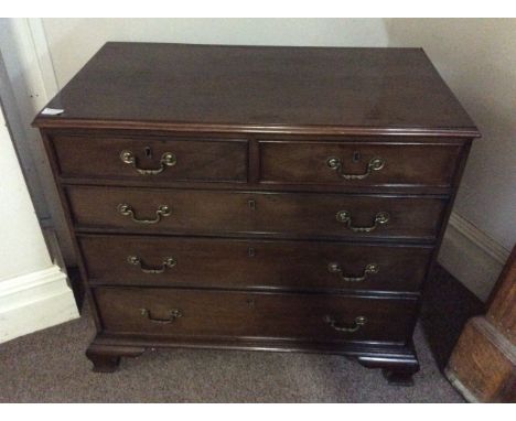 An early 19th century three long and two short drawer chest on bracket feet. IMPORTANT: Online viewing and bidding only. Coll