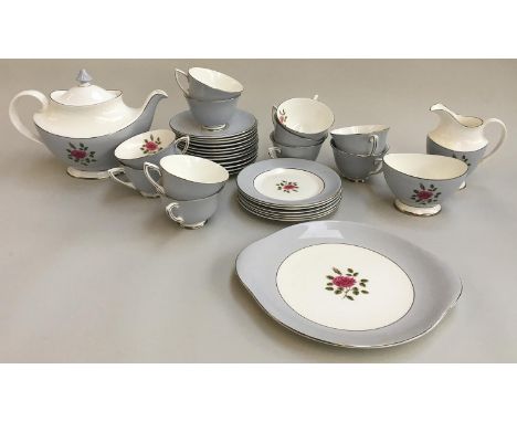 A Royal Doulton 'Chateau Rose' tea service, including teacups (12), saucers (12), side plates (6), teapot, milk jug, sugar bo