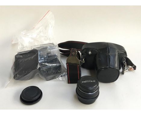 A Pentax MV1 35mm camera, with SMC Pentax-M 28mm f2.8 lens No. 7569121; Pentax-M 50mm f2 lens No. 5039992, and various access