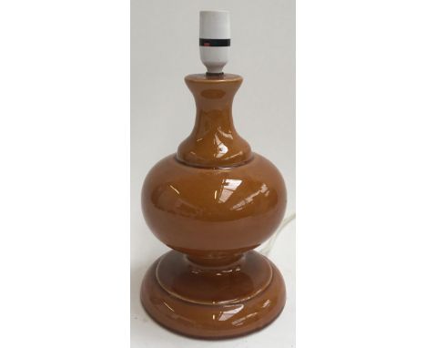 A brown ceramic table lamp 