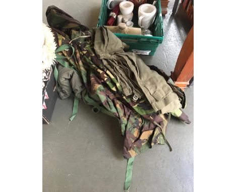 Six army/camo trousers and a waterproof camo jacket 