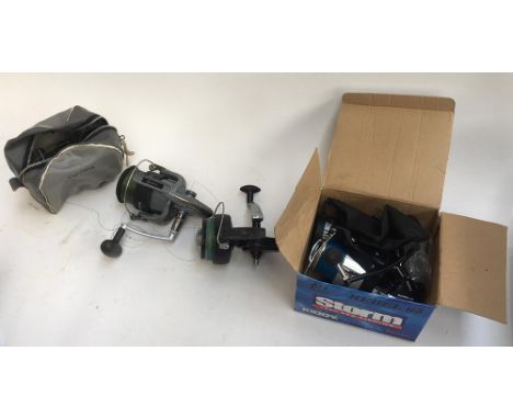 Daiwa AG6000A fixed spool sea reel; Storm Rebel 65 fixed spool sea reel, boxed with line and spare spool; Daiwa Procaster ST8