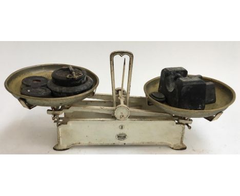 A set of Austrian brass and enamel kitchen scales by J. Natauschek, with weights 