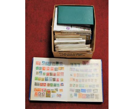 A schoolboy stamp album, contents mainly being Commonwealth examples together with various first day covers, etc