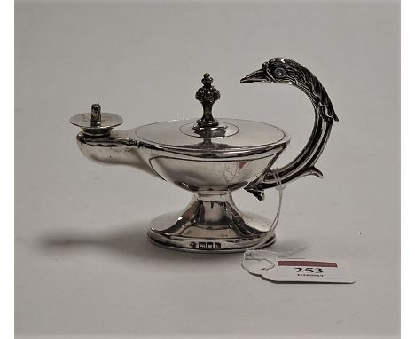 An Edwardian silver table cigar lighter, in the form of a lamp, the handle in the form of a birds head