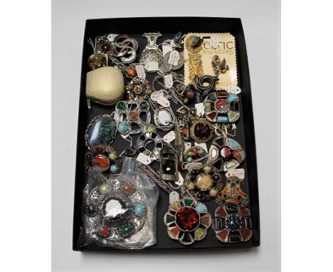 A large collection of assorted mainly costume jewellery to include Scottish style hardstone inset white metal brooches, vario