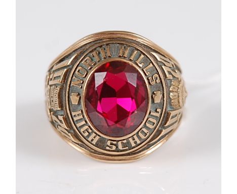 An American 10ct gold and synthetic ruby set commemorative signet ring, for North Hills High School, dated 1974, 17.2g, size 