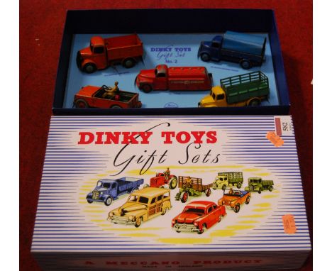 A reproduction Dinky Toys No. 2 gift set box containing period Dinky Toys to include Austin van, Dodge livestock carrier, Ess