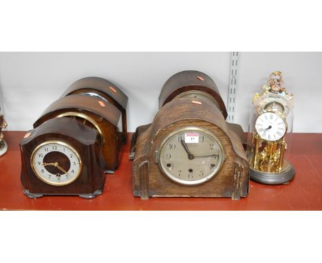 A 1940s oak cased mantel clock, having a silvered dial with Arabic numerals, eight day movement, by the Westminster Clock Com